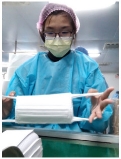 花木支行员工参加口罩生产志愿服务